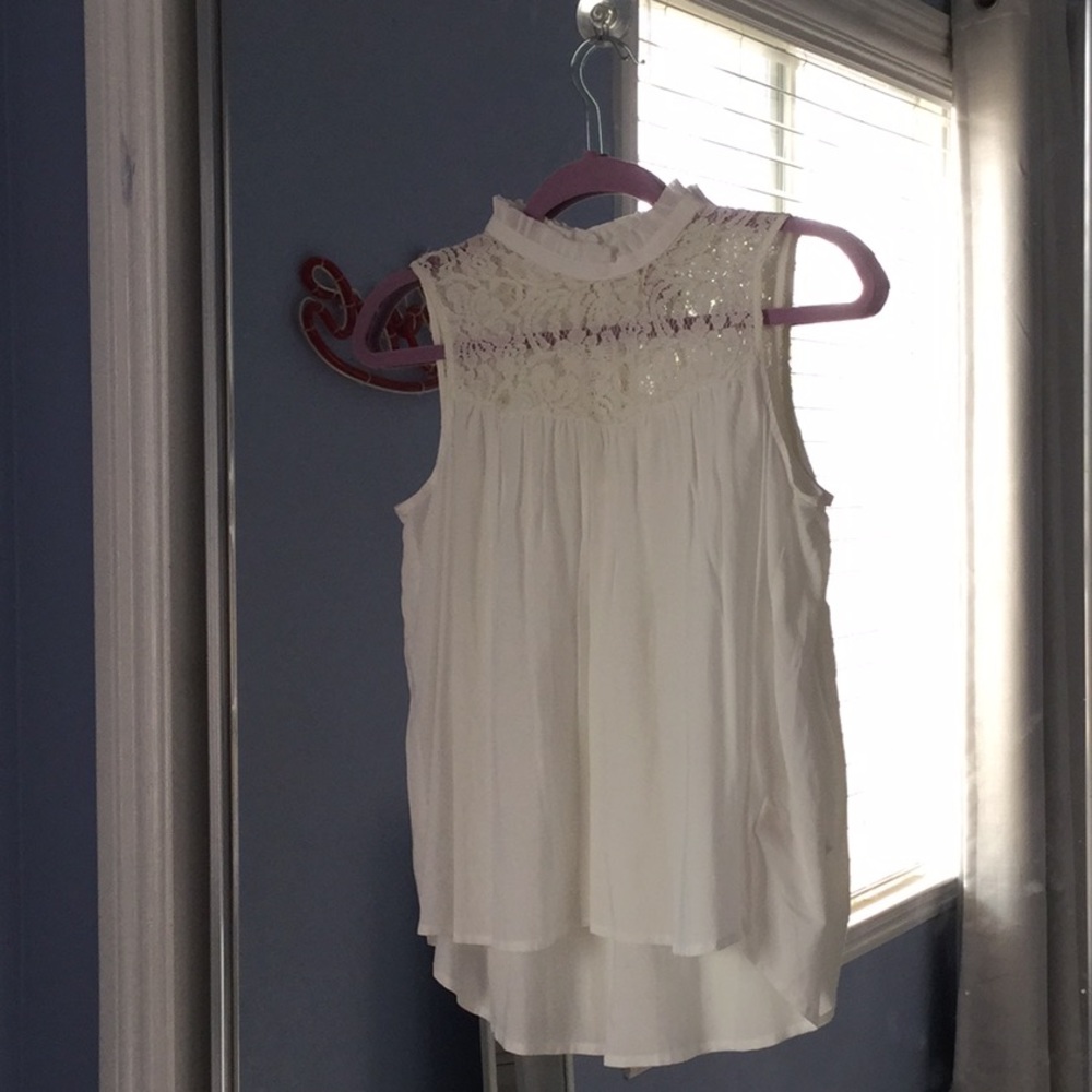 Elegant white laced blouse